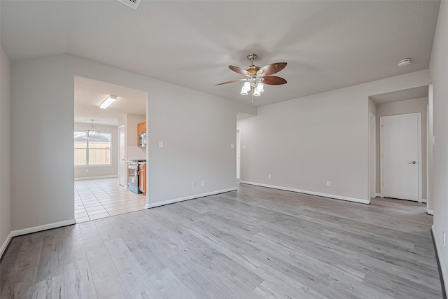2706 Star Peak Dr, Houston, TX 77088 - empty room with a ceiling fan, baseboards, a chandelier, light wood-style flooring, and a smoke detector