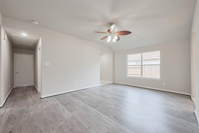 2706 Star Peak Dr, Houston, TX 77088 - spare room featuring attic access, a smoke detector, ceiling fan, and wood finished floors