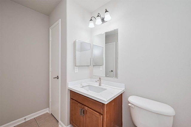 2706 Star Peak Dr, Houston, TX 77088 - bathroom with tile patterned floors, vanity, toilet, and baseboards