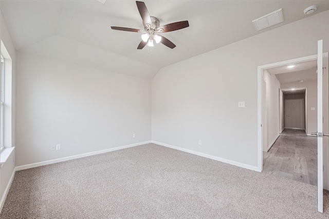 2706 Star Peak Dr, Houston, TX 77088 - unfurnished room with light carpet, ceiling fan, vaulted ceiling, a smoke detector, and baseboards