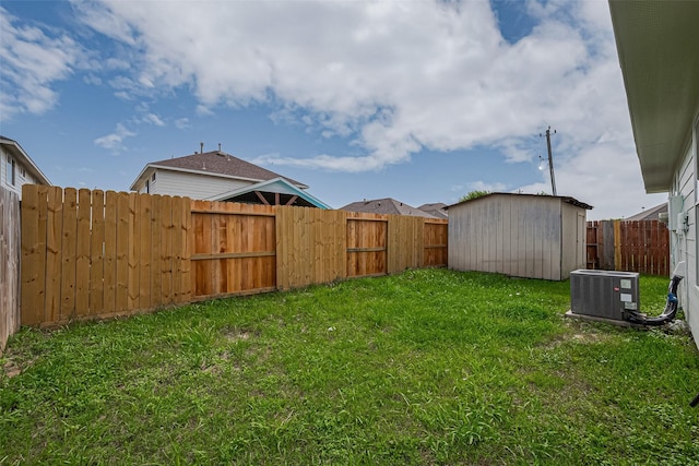 2706 Star Peak Dr, Houston, TX 77088 - view of yard featuring a storage unit, central AC unit, and an outbuilding