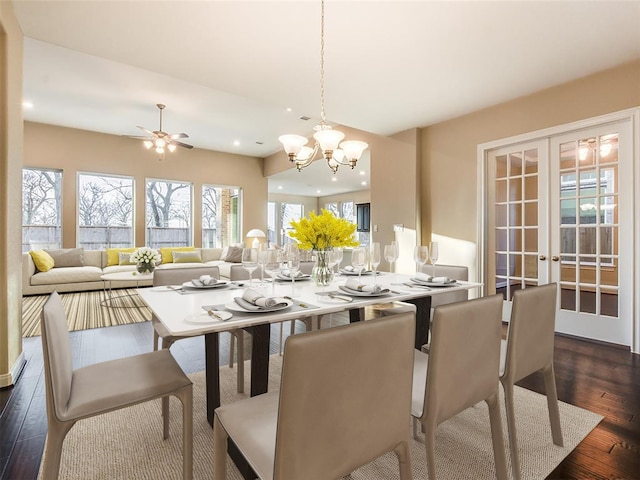 4218 Tanner Woods Ln, Sugar Land, TX 77479 - dining room featuring dark wood-style flooring, french doors, recessed lighting, a chandelier, and ceiling fan