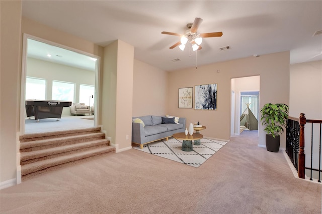 4218 Tanner Woods Ln, Sugar Land, TX 77479 - carpeted living area with a ceiling fan and baseboards