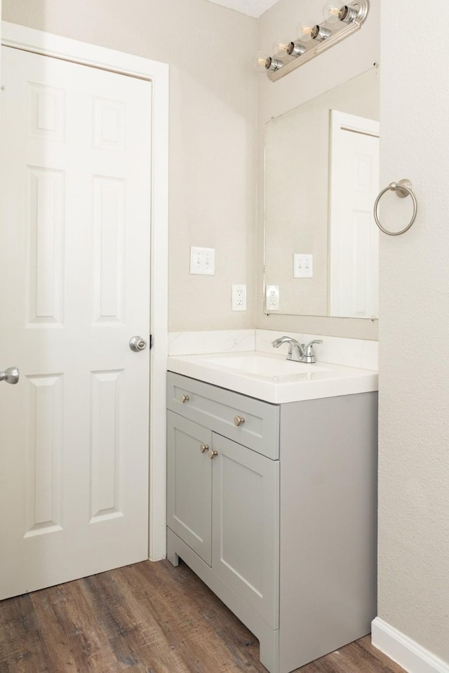 108 Chandler Dr, Baytown, TX 77521 - bathroom with wood finished floors and vanity
