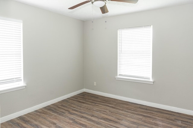 108 Chandler Dr, Baytown, TX 77521 - empty room featuring ceiling fan, dark wood-style flooring, and baseboards