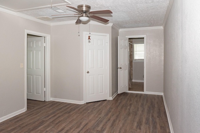 108 Chandler Dr, Baytown, TX 77521 - unfurnished bedroom featuring wood finished floors, baseboards, ornamental molding, ceiling fan, and a textured ceiling