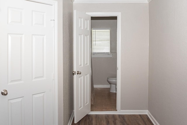 108 Chandler Dr, Baytown, TX 77521 - bathroom with toilet, baseboards, and wood finished floors