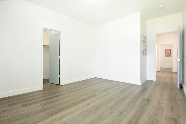 9507 Flying Eagle Ct, Houston, TX 77083 - empty room with wood finished floors and baseboards
