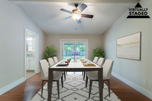 16466 Mandate Dr, Houston, TX 77049 - dining room with wood finished floors, baseboards, a ceiling fan, and a textured ceiling
