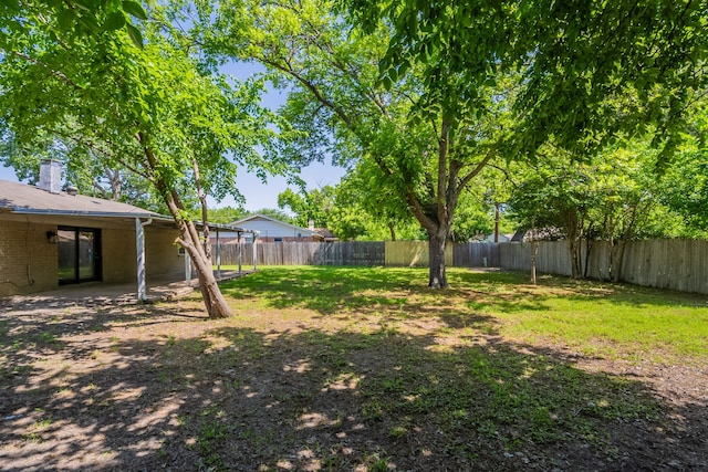 16466 Mandate Dr, Houston, TX 77049 - fenced backyard with a patio area