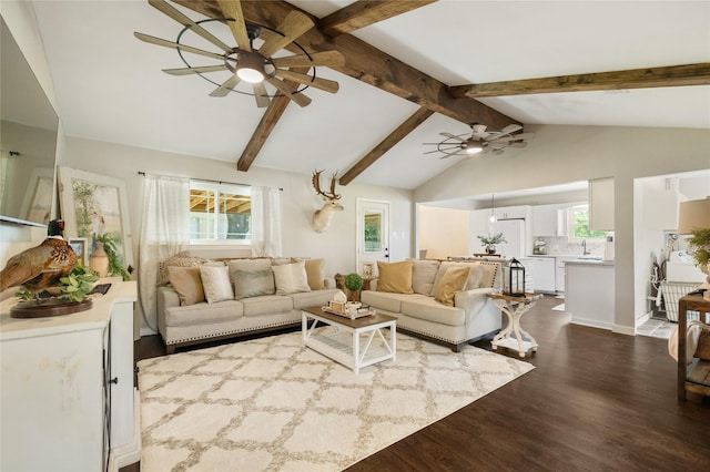 1209 Kansas Ave S, Anahuac, TX 77514 - living area featuring a ceiling fan and dark wood finished floors