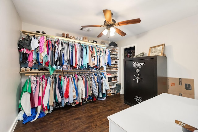 1209 Kansas Ave S, Anahuac, TX 77514 - spacious closet with wood finished floors and ceiling fan
