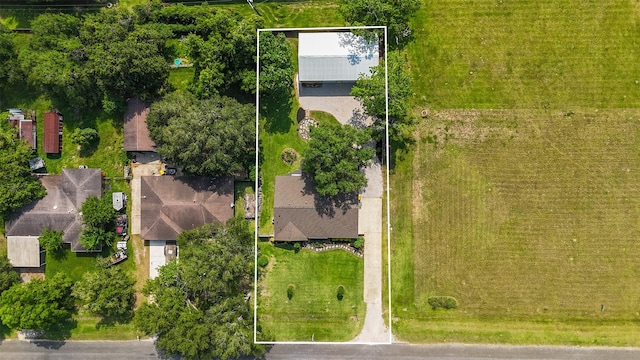 1209 Kansas Ave S, Anahuac, TX 77514 - aerial view of residential area featuring property boundaries highlighted