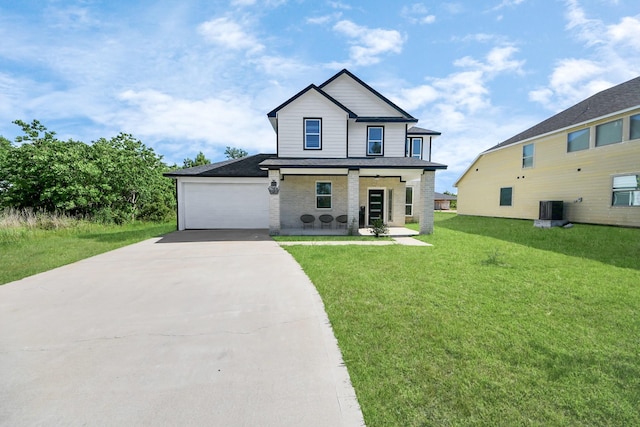 273 Rd 5134, Cleveland, TX 77327 - view of front of home with concrete driveway, covered porch, cooling unit, a front lawn, and an attached garage