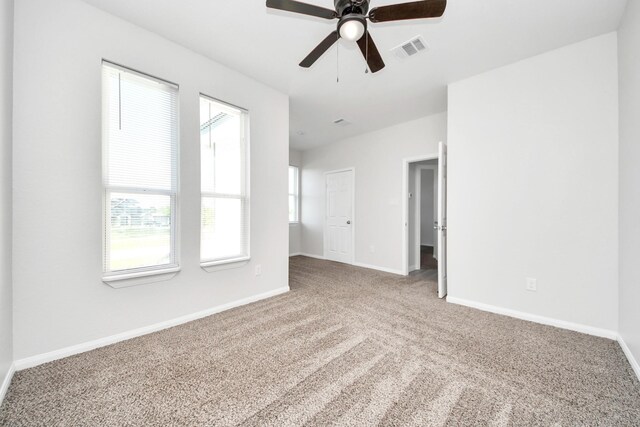 273 Rd 5134, Cleveland, TX 77327 - carpeted spare room with ceiling fan and baseboards