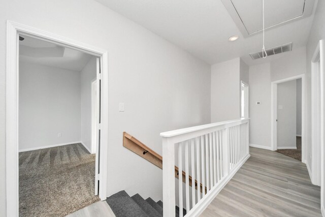 273 Rd 5134, Cleveland, TX 77327 - hall with attic access, an upstairs landing, recessed lighting, wood finished floors, and baseboards