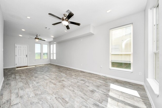 273 Rd 5134, Cleveland, TX 77327 - empty room featuring ceiling fan, recessed lighting, baseboards, and wood finished floors