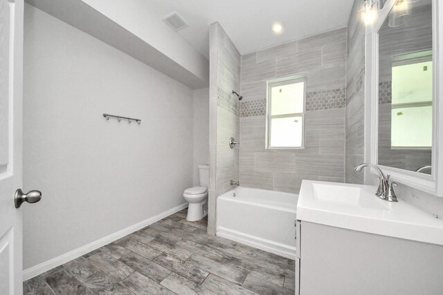 273 Rd 5134, Cleveland, TX 77327 - full bath with toilet, vanity, shower / tub combination, baseboards, and recessed lighting