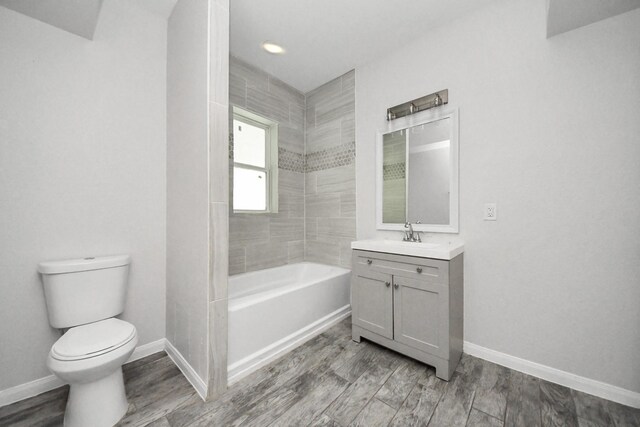 273 Rd 5134, Cleveland, TX 77327 - full bath featuring toilet, vanity, baseboards, and wood finished floors