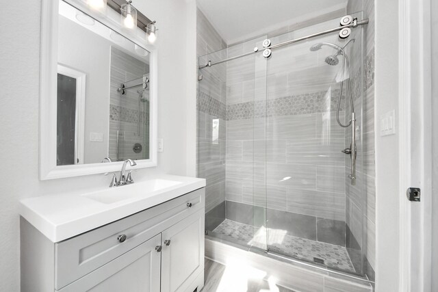 273 Rd 5134, Cleveland, TX 77327 - bathroom featuring a stall shower and vanity