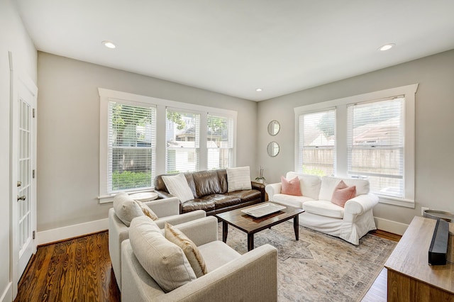 3708 Watson St, Houston, TX 77009 - living room featuring baseboards, wood finished floors, and recessed lighting