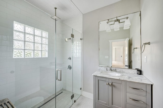3708 Watson St, Houston, TX 77009 - full bath with vanity, a shower stall, and baseboards