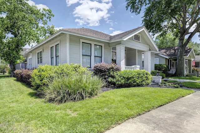 3708 Watson St, Houston, TX 77009 - view of front of house featuring a front lawn and covered porch