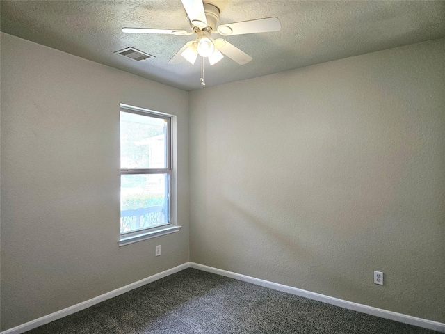 20731 Cypress Post Dr, Cypress, TX 77433 - spare room with dark carpet, baseboards, a textured ceiling, and ceiling fan