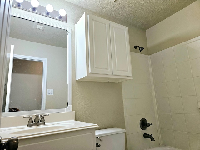 20731 Cypress Post Dr, Cypress, TX 77433 - bathroom with toilet, vanity, a textured ceiling, and shower / washtub combination
