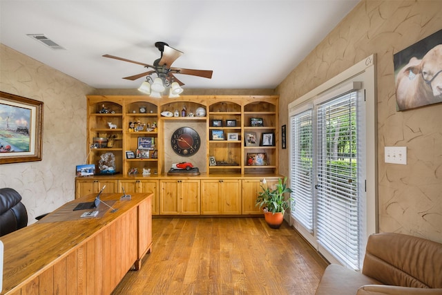 4430 Fm 546, Princeton, TX 75407 - office area featuring light wood-type flooring, ceiling fan, and a textured wall