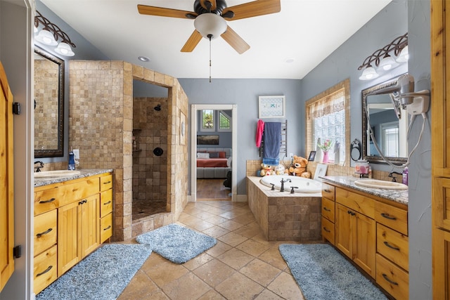 4430 Fm 546, Princeton, TX 75407 - bathroom featuring a stall shower, a ceiling fan, a garden tub, and two vanities