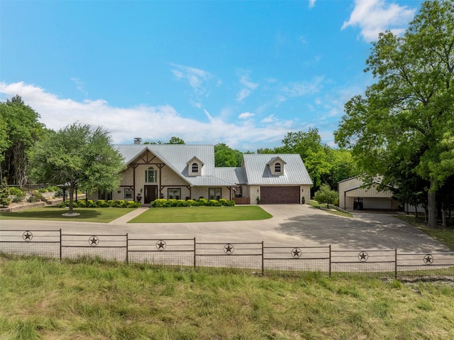 4430 Fm 546, Princeton, TX 75407 - view of front facade with metal roof, driveway, and a detached garage
