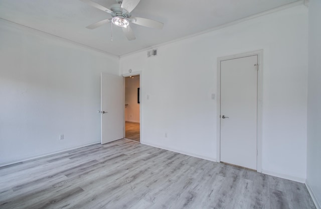 716 Bering Dr Unit 30, Houston, TX 77057 - unfurnished room with wood finished floors and a ceiling fan