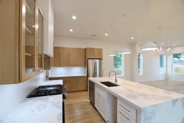 510 E 37th St, Houston, TX 77022 - kitchen with a sink, stainless steel appliances, healthy amount of natural light, light wood-style flooring, and recessed lighting
