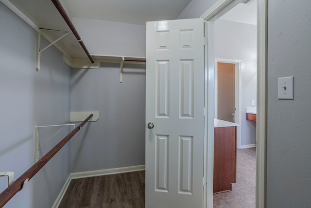 13035 Echo Landing Dr, Houston, TX 77070 - spacious closet with wood finished floors