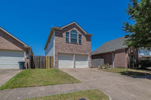 13035 Echo Landing Dr, Houston, TX 77070 - view of front of home featuring brick siding, concrete driveway, and an attached garage