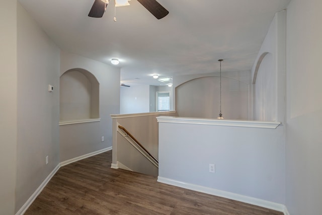 13035 Echo Landing Dr, Houston, TX 77070 - spare room with a ceiling fan, dark wood-style flooring, and baseboards