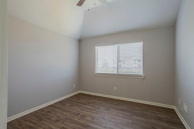 13035 Echo Landing Dr, Houston, TX 77070 - spare room featuring dark wood-style flooring, a ceiling fan, lofted ceiling, and baseboards