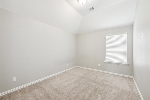 6406 Diamantina Ct, Katy, TX 77493 - spare room with light colored carpet, baseboards, and lofted ceiling