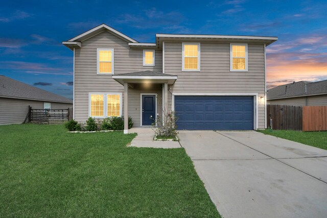 696 Rd 5105, Cleveland, TX 77327 - traditional home featuring an attached garage and driveway