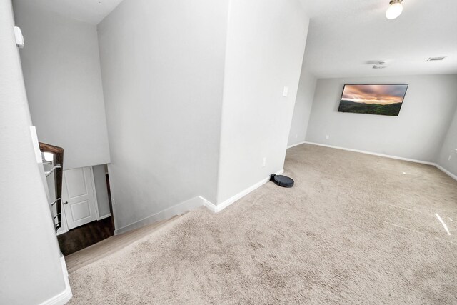 696 Rd 5105, Cleveland, TX 77327 - unfurnished living room featuring carpet flooring and baseboards