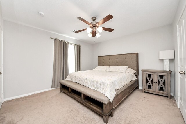 696 Rd 5105, Cleveland, TX 77327 - carpeted bedroom with baseboards and a ceiling fan