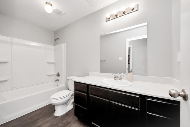 696 Rd 5105, Cleveland, TX 77327 - full bath with wood finished floors, toilet, vanity, and washtub / shower combination