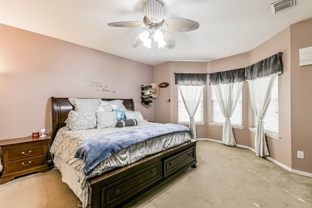 307 Squall Ct, Crosby, TX 77532 - bedroom featuring light colored carpet, ceiling fan, and baseboards