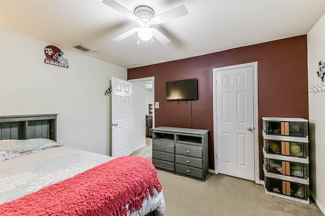 307 Squall Ct, Crosby, TX 77532 - bedroom with light colored carpet and a ceiling fan