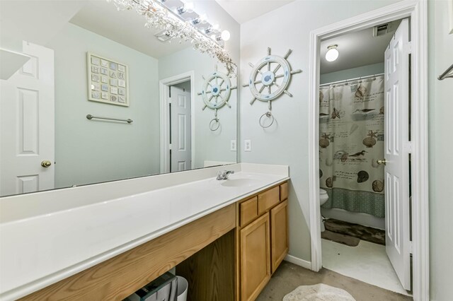 307 Squall Ct, Crosby, TX 77532 - bathroom featuring toilet, vanity, and curtained shower