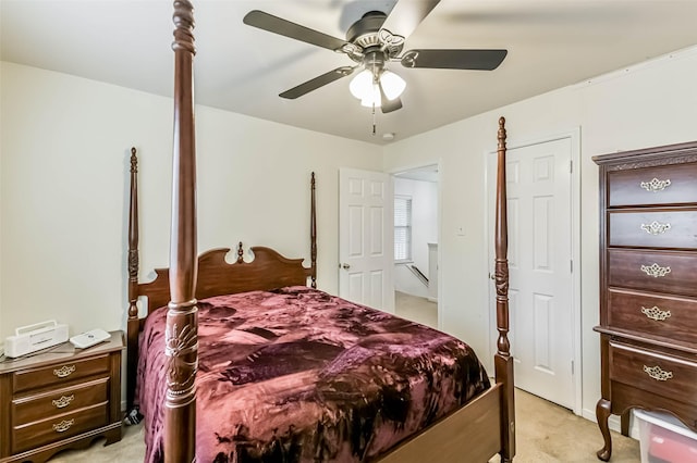 307 Squall Ct, Crosby, TX 77532 - bedroom featuring light colored carpet and a ceiling fan
