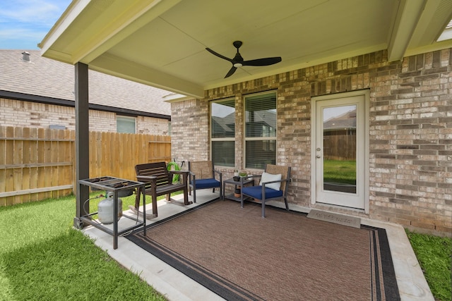 204 Catalina Cove Dr, Katy, TX 77493 - view of patio / terrace featuring fence, a ceiling fan, and an outdoor living space
