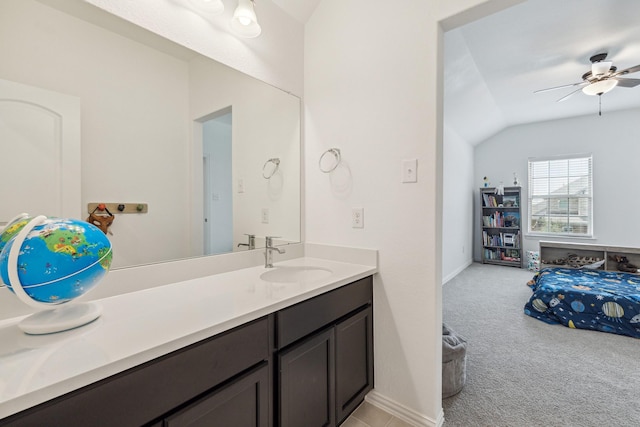 204 Catalina Cove Dr, Katy, TX 77493 - bathroom with a ceiling fan, lofted ceiling, vanity, and baseboards
