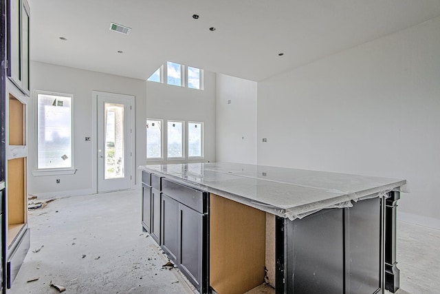 177 Peninsula Point Dr, Montgomery, TX 77356 - kitchen with a large island and baseboards